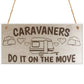Caravaners Do It On The Move Novelty Wooden Hanging Plaque