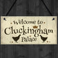 Welcome To Cluckingham Palace Novelty Garden Hanging Plaque